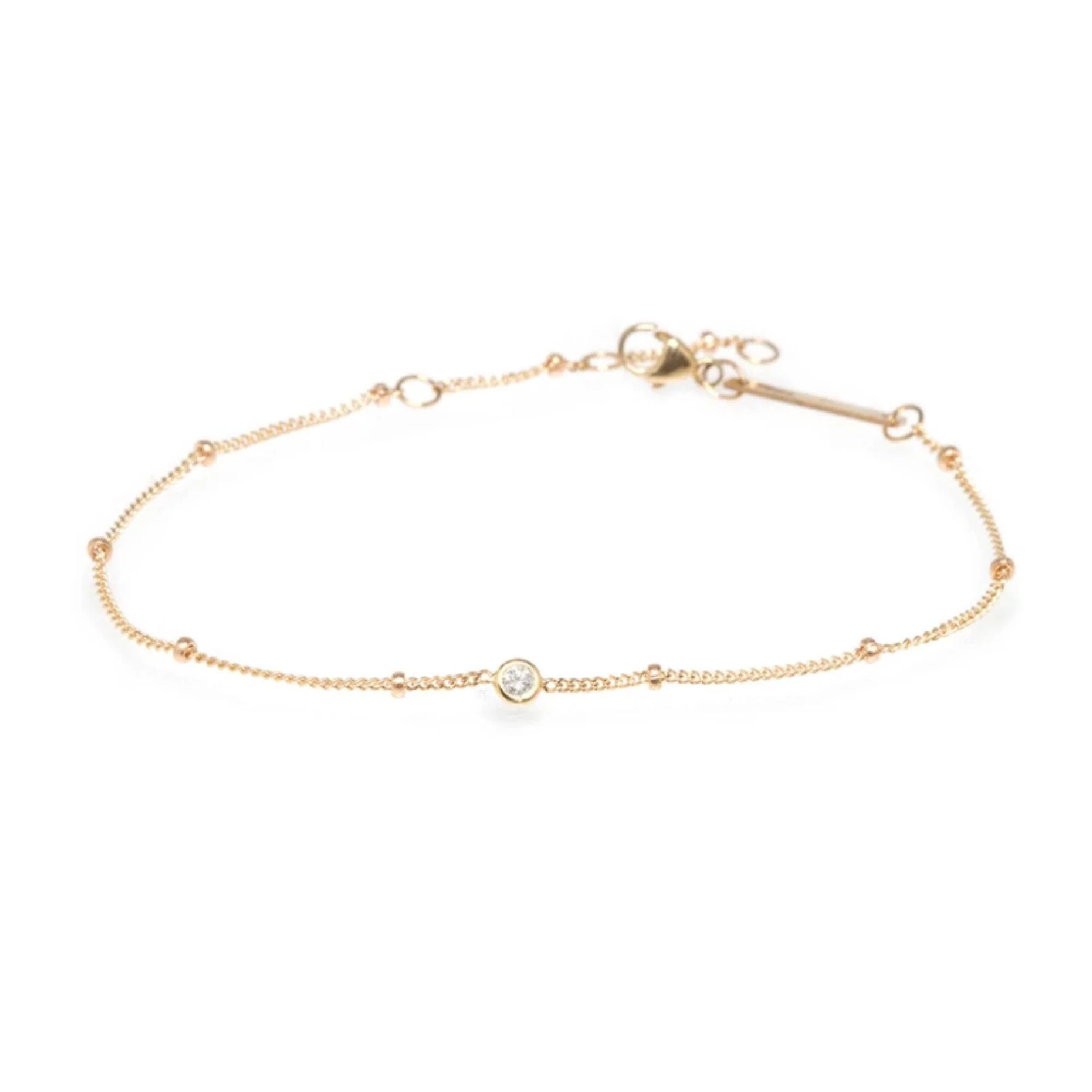 14 KARAT YELLOW GOLD CHAIN BRACELET WITH FLOATING DIAMOND